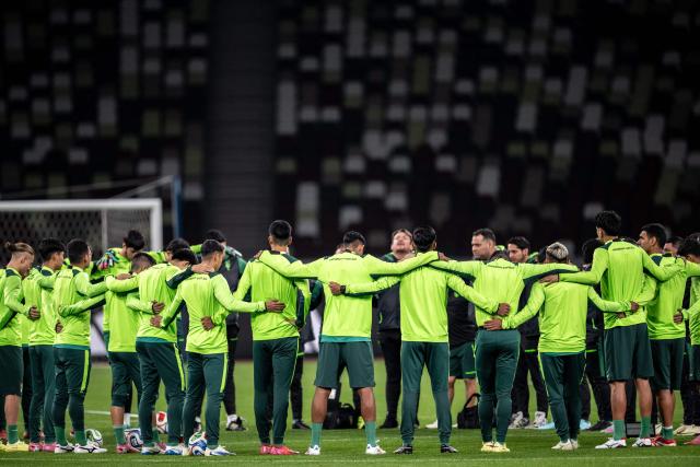 Bolivia's players take part in a training session ahead of their friendly football match against Japan at the National Stadium in Tokyo on November 17, 2025. (Photo by Philip FONG / AFP)