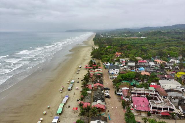 Aerial view of Olon, Santa Elena, Ecuador, on November 17, 2025. Ecuadoran voters roundly rejected the return of US military bases to the country in a referendum Sunday, a major political blow to Trump-friendly President Daniel Noboa. (Photo by MARCOS PIN / AFP)