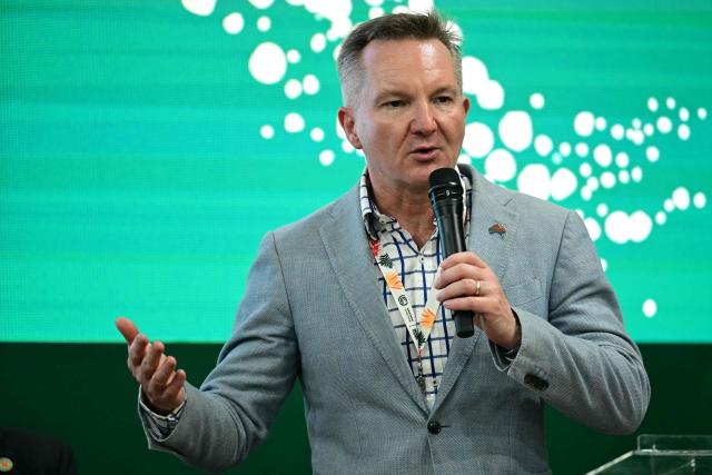 The Minister for Climate Change and Energy of Australia, Chris Bowen, speaks at Australia's pavilion during the COP30 UN Climate Change Conference in Belem, Para State, Brazil, on November 17, 2025. Bowen launched into public appearances on his first day at COP30 on Monday, making a light-hearted quip about the hosting war before a friendly crowd at the Australian pavilion. "I am in the middle of a lot of negotiations -- and not just about the most obvious things," Bowen said with a smile, drawing laughs from the crowd. Resolving the COP31 standoff is Bowen's top priority in Belem and the minister has bilateral meetings scheduled with his Turkish climate counterpart, Murat Kurum, a senior Australian government source told AFP. (Photo by Pablo PORCIUNCULA / AFP)