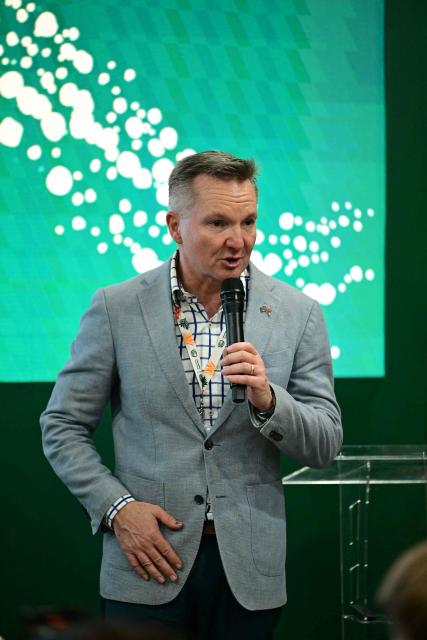 The Minister for Climate Change and Energy of Australia, Chris Bowen, speaks at Australia's pavilion during the COP30 UN Climate Change Conference in Belem, Para State, Brazil, on November 17, 2025. Bowen launched into public appearances on his first day at COP30 on Monday, making a light-hearted quip about the hosting war before a friendly crowd at the Australian pavilion. "I am in the middle of a lot of negotiations -- and not just about the most obvious things," Bowen said with a smile, drawing laughs from the crowd. Resolving the COP31 standoff is Bowen's top priority in Belem and the minister has bilateral meetings scheduled with his Turkish climate counterpart, Murat Kurum, a senior Australian government source told AFP. (Photo by Pablo PORCIUNCULA / AFP)