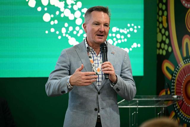 The Minister for Climate Change and Energy of Australia, Chris Bowen, speaks at Australia's pavilion during the COP30 UN Climate Change Conference in Belem, Para State, Brazil, on November 17, 2025. Bowen launched into public appearances on his first day at COP30 on Monday, making a light-hearted quip about the hosting war before a friendly crowd at the Australian pavilion. "I am in the middle of a lot of negotiations -- and not just about the most obvious things," Bowen said with a smile, drawing laughs from the crowd. Resolving the COP31 standoff is Bowen's top priority in Belem and the minister has bilateral meetings scheduled with his Turkish climate counterpart, Murat Kurum, a senior Australian government source told AFP. (Photo by Pablo PORCIUNCULA / AFP)