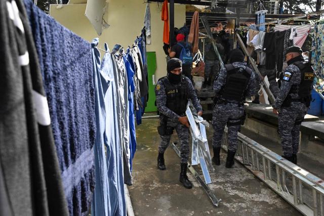 Special Police Forces take part in a raid at Pavoncito Prison in Fraijanes, Guatemala on November 17, 2025. The operation is part of measures announced by the new security authorities to regain control of the country's prisons following the October escape of 20 Barrio 18 gang leaders from Fraijanes II Prison, adjacent to Pavoncito. (Photo by JOHAN ORDONEZ / AFP)