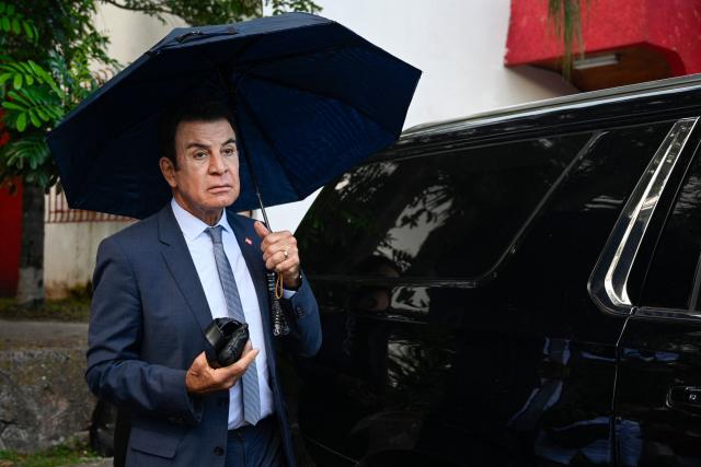 Honduran presidential candidate and media personality Salvador Nasralla, of the right-wing Liberal Party (PL), leaves the headquarters of the Central Executive Committee of the Liberal Party after speaking to the press in Tegucigalpa on November 17, 2025. Nasralla said that if he wins the election, his government will not recognize Venezuelan President Nicolas Maduro. Hondurans will head to the polls on November 30 to elect a president, 128 members of the National Congress, 298 mayors, and 20 representatives to the Central American Parliament. (Photo by Orlando SIERRA / AFP)