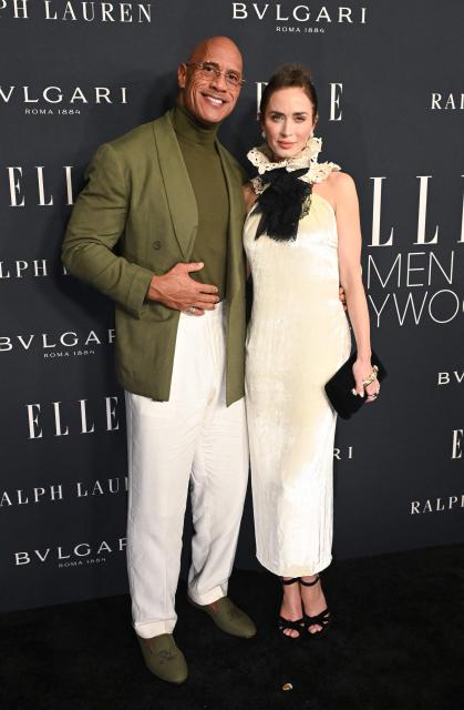 US-British actress Emily Blunt and US actor Dwayne Johnson attend Elle 2025 Women in Hollywood celebration at the Four Seasons hotel in Beverly Hills, California on November 17, 2025. (Photo by Lisa O'CONNOR / AFP)