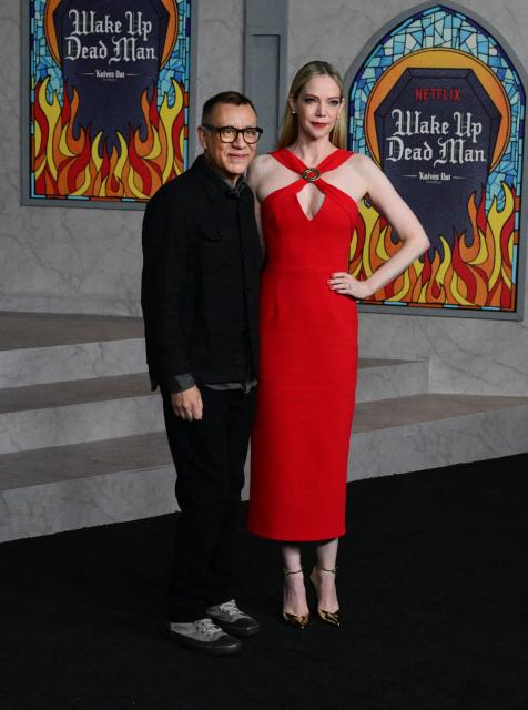 US actress Riki Lindhome and US actor and comedian Fred Armisen attend the LA premiere of Netflix's "Wake Up Dead Man: A Knives Out Mystery" at the Academy Museum of Motion Pictures in Los Angeles on November 17, 2025. (Photo by Frederic J. BROWN / AFP)