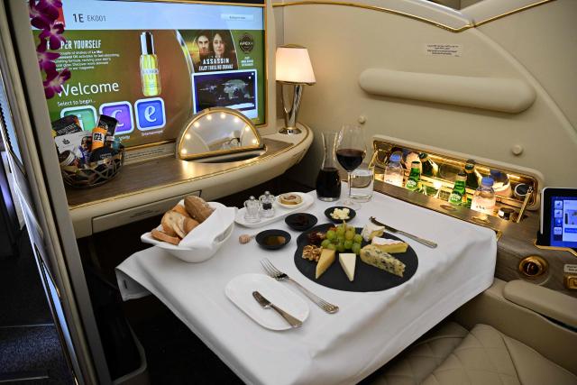 A first-class seat of an Emirates A380 plane at Al-Maktoum International Airport during the Dubai Airshow 2025 in Dubai on November 17, 2025. (Photo by Giuseppe CACACE / AFP)