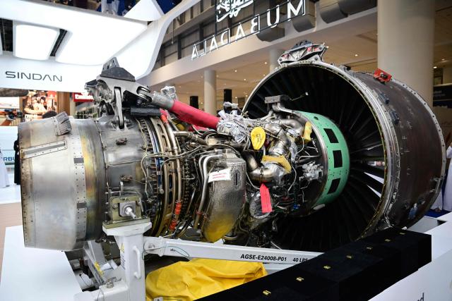 A Pratt and Whitney PW1900G engine is on diplay at Al-Maktoum International Airport during the Dubai Airshow 2025 in Dubai on November 17, 2025. (Photo by Giuseppe CACACE / AFP)