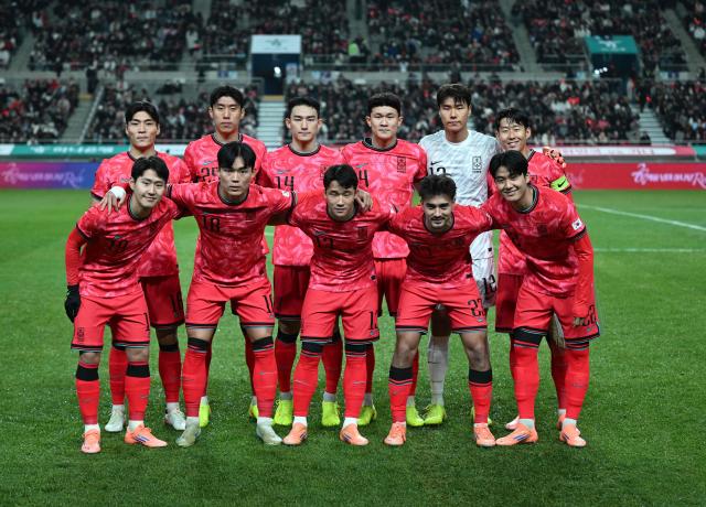 South Korea's players pose for a team photo prior to the start of the international friendly football match between South Korea and Ghana in Seoul on November 18, 2025. (Photo by Jung Yeon-je / AFP)