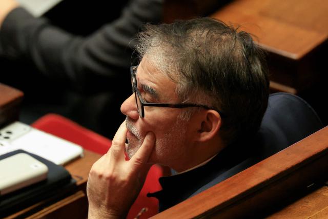 Socialistes et Apparentes' MP Olivier Faure attends a session of questions to the government at the French National Assembly in Paris, on November 18, 2025. An unidentified gunman killed Mehdi Kessaci, who wanted to become a police officer, on November 13, 2025 in Marseille. (Photo by Alain JOCARD / AFP)