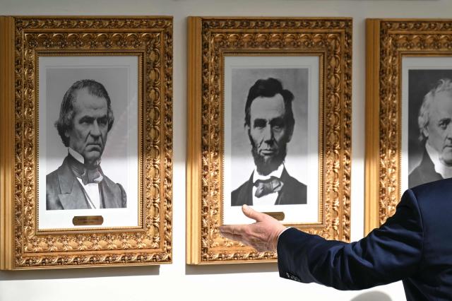 US President Donald Trump and Crown Prince and Prime Minister of the Kingdom of Saudi Arabia Mohammed bin Salman walk down the Colonnade on the way to the Oval Office of the White House in Washington, DC on November 18, 2025. Saudi Crown Prince Mohammed bin Salman arrived at the White House to fanfare and a jet flyover Tuesday, in his first visit to the United States since the 2018 murder of journalist Jamal Khashoggi. (Photo by ANDREW CABALLERO-REYNOLDS / AFP)