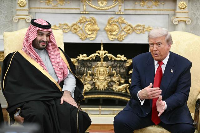 US President Donald Trump meets with Crown Prince and Prime Minister of the Kingdom of Saudi Arabia Mohammed bin Salman in the Oval Office of the White House in Washington, DC on November 18, 2025. Saudi Crown Prince Mohammed bin Salman arrived at the White House to fanfare and a jet flyover Tuesday, in his first visit to the United States since the 2018 murder of journalist Jamal Khashoggi. (Photo by Brendan SMIALOWSKI / AFP)