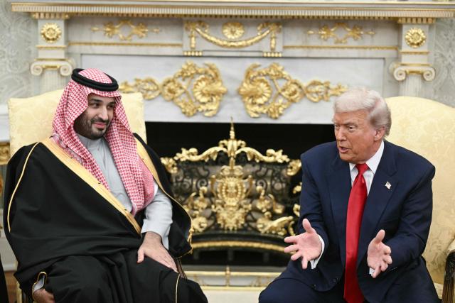 US President Donald Trump meets with Crown Prince and Prime Minister of the Kingdom of Saudi Arabia Mohammed bin Salman in the Oval Office of the White House in Washington, DC on November 18, 2025. Saudi Crown Prince Mohammed bin Salman arrived at the White House to fanfare and a jet flyover Tuesday, in his first visit to the United States since the 2018 murder of journalist Jamal Khashoggi. (Photo by Brendan SMIALOWSKI / AFP)