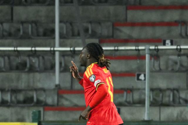 Belgium's forward #11 Jeremy Doku celebrates after scoring his team second goal during the FIFA World Cup 2026 Group J European qualification football match between Belgium and Liechtenstein at the Maurice-Dufrasne stadium, in Liege, on November 18, 2025. (Photo by NICOLAS TUCAT / AFP)
