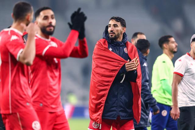 Tunisia's forward #09 Hazem Mastouri (R) reacts at the end of the International friendly football match between Brazil and Tunisia at Stade Pierre-Mauroy, in Villeneuve-d'Ascq, northern France, on November 18, 2025. (Photo by Sameer Al-DOUMY / AFP)