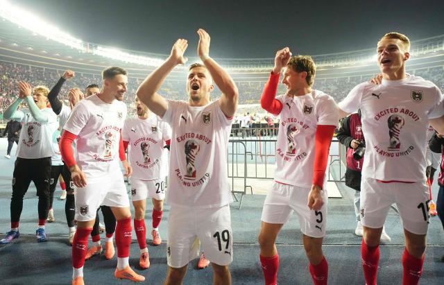 Austria's players celebrate after the FIFA World Cup 2026 European qualification Group H football match between Austria and Bosnia and Herzegovina, in Vienna on November 18, 2025. (Photo by GEORG HOCHMUTH / APA / AFP) / Austria OUT