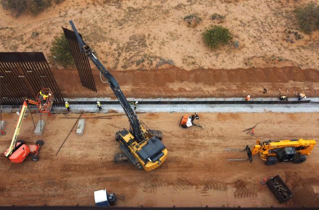 This aerial view shows the secondary border wall built between Santa Teresa, New Mexico, United States and Ciudad Juarez, Chihuahua, Mexico on November 18, 2025. (Photo by HERIKA MARTINEZ / AFP)