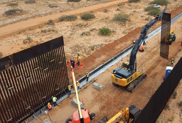 This aerial view shows the secondary border wall built between Santa Teresa, New Mexico, United States and Ciudad Juarez, Chihuahua, Mexico on November 18, 2025. (Photo by HERIKA MARTINEZ / AFP)