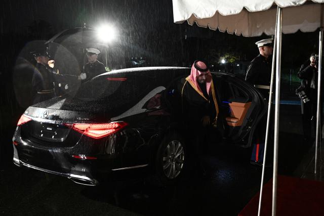 The Crown Prince and Prime Minister of the Kingdom of Saudi Arabia Mohammed bin Salman arrives to the White House for a state dinner with US President Donald Trump and First Lady Melania Trump in Washington, DC on November 18, 2025. (Photo by Brendan SMIALOWSKI / AFP)