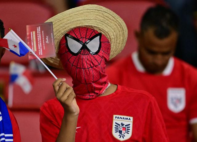 Panama fans cheer before the 2026 FIFA World Cup Concacaf qualifier football match between Panama and El Salvador at the Rommel Fernandez Stadium in Panama City on November 18, 2025. (Photo by MARTIN BERNETTI / AFP)