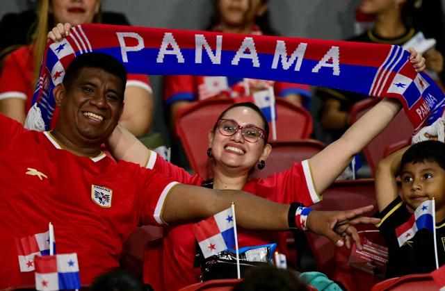 Panama fans cheer before the 2026 FIFA World Cup Concacaf qualifier football match between Panama and El Salvador at the Rommel Fernandez Stadium in Panama City on November 18, 2025. (Photo by MARTIN BERNETTI / AFP)