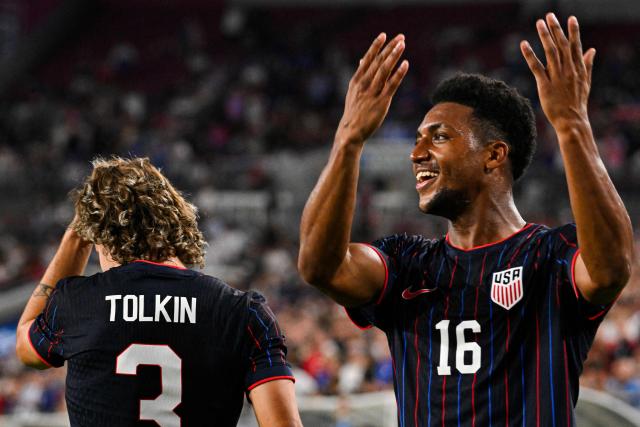 US defender #16 Alex Freeman celebrates after scoring his team's second goal during the international friendly football match between USA and Uruguay at the Raymond James Stadium in Tampa, Florida on November 18, 2025. (Photo by Miguel J. Rodriguez Carrillo / AFP)