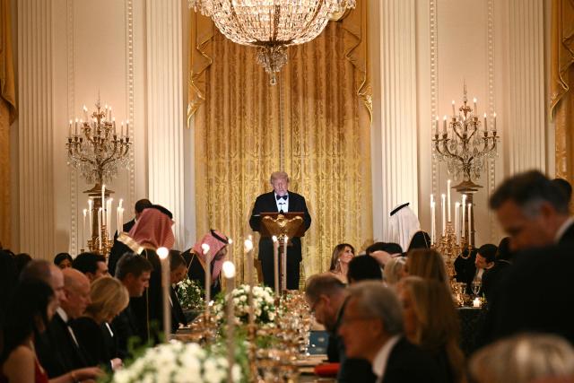 US President Donald Trump speaks during an official dinner with Crown Prince and Prime Minister of the Kingdom of Saudi Arabia Mohammed bin Salman in the East Room of the White House in Washington, DC on November 18, 2025. (Photo by Brendan SMIALOWSKI / AFP)