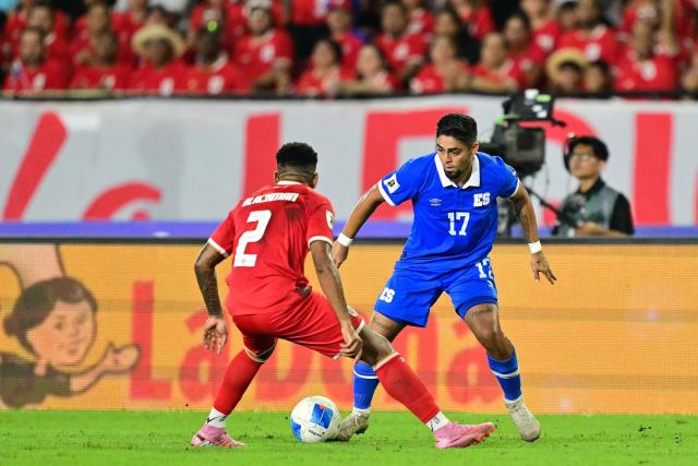 Panama's defender #02 Cesar Blackman and El Salvador's midfielder #17 Jairo Henriquez fight for the ball during the 2026 FIFA World Cup Concacaf qualifier football match between Panama and El Salvador at the Rommel Fernandez Stadium in Panama City on November 18, 2025. (Photo by MARTIN BERNETTI / AFP)