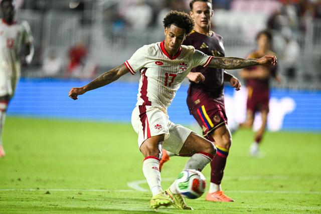 Canada's forward #17 Tajon Buchanan kicks the ball in an attempt to score during the international friendly football match between Canada and Venezuela at Chase Stadium in Fort Lauderdale, Florida, on November 18, 2025. (Photo by CHANDAN KHANNA / AFP)