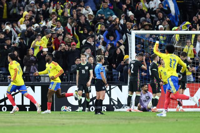 Colombia’s midfielder #16 Jefferson Lerma Celebrates after scoring a goal during the international friendly football match between Colombia and Australia at Citifield stadium in the Queens borough of New York City on November 18, 2025. (Photo by CHARLY TRIBALLEAU / AFP)