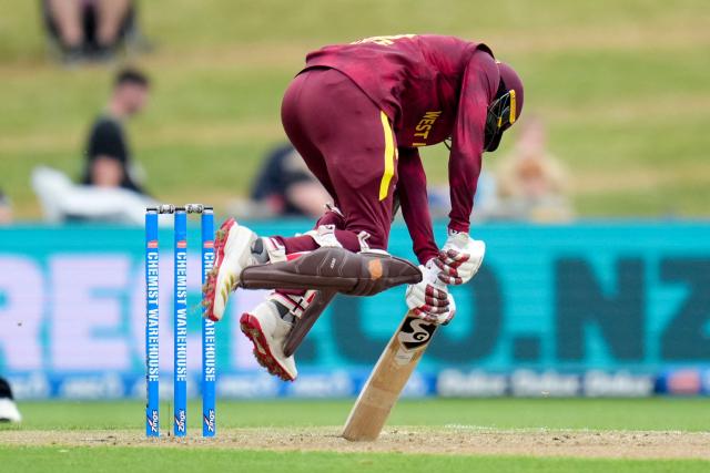 West Indies' Ackeem Auguste jumps away from the ball during the second one-day international cricket match between New Zealand and the West Indies at McLean Park in Napier on November 19, 2025. (Photo by Marty MELVILLE / AFP)