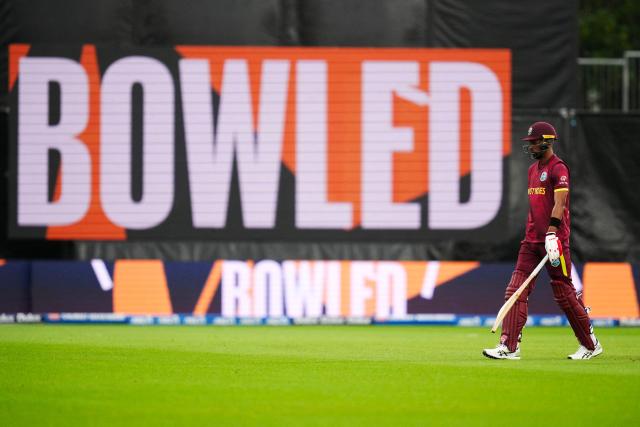 West Indies' Roston Chase walks from the field after being bowled during the second one-day international cricket match between New Zealand and the West Indies at McLean Park in Napier on November 19, 2025. (Photo by Marty MELVILLE / AFP)