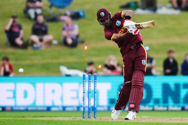 West Indies' Roston Chase is bowled during the second one-day international cricket match between New Zealand and the West Indies at McLean Park in Napier on November 19, 2025. (Photo by Marty MELVILLE / AFP)