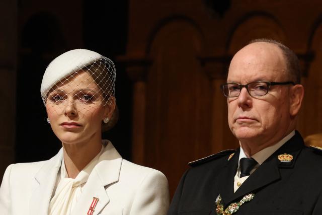 Charlene of Monaco and Albert II of Monaco wait prior to attend the mass at Monaco's cathedral as part of the ceremonies marking 'National Day in Monaco' also known as ' The Sovereign Prince's Day', in Monaco on November 19, 2025. (Photo by Valery HACHE / AFP) / / NO TABLOIDS WEB & PRINT, NO DAILY MAIL, NO DAILY MAIL GROUP, NO VOICI, NO CLOSER