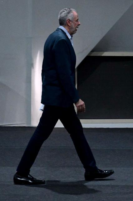 COP30 President Andre Correa do Lago walks along a corridor during the COP30 UN Climate Change Conference in Belem, Para State, Brazil on November 19, 2025. COP30 host Brazil pushed Tuesday for an early breakthrough at UN climate talks, with nations weighing a proposed deal that seeks to bridge major differences on fossil fuels, finance and trade barriers. Brazil wants an agreement reached by midweek, with President Luiz Inacio Lula da Silva to make an unexpected return on Wednesday to Belem, the host city in the country's Amazon region, in a high-level bid to seal a deal. (Photo by Pablo PORCIUNCULA / AFP)