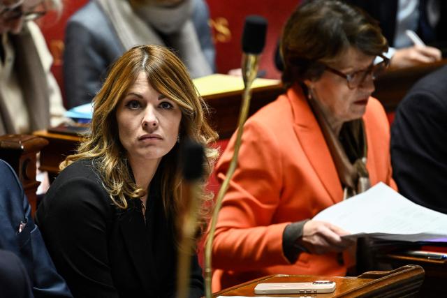 France's Government Spokesperson Maud Bregeon (L) looks on during a session of questions to the government at The National Assembly, France's lower house parliament, in Paris on November 19, 2025. (Photo by JULIEN DE ROSA / AFP)