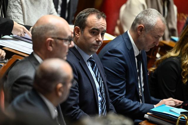 France's Prime Minister Sebastien Lecornu looks on during a session of questions to the government at The National Assembly, France's lower house parliament, in Paris on November 19, 2025. (Photo by JULIEN DE ROSA / AFP)