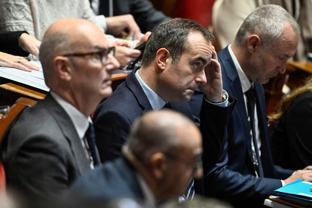 France's Prime Minister Sebastien Lecornu looks on during a session of questions to the government at The National Assembly, France's lower house parliament, in Paris on November 19, 2025. (Photo by JULIEN DE ROSA / AFP)