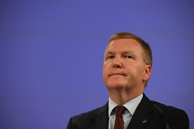 EU Commissioner for Economy and Productivity, Implementation and Simplification Valdis Dombrovskis looks on during a press confrence to present the digital simplification package at the EU headquarters in Brussels on November 19, 2025. (Photo by Nicolas TUCAT / AFP)
