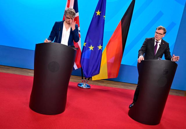 German Foreign Minister Johann Wadephul (R) and his British counterpart Yvette Cooper address a press conference following talks at the Foreign Ministry in Berlin on November 19, 2025. (Photo by John MACDOUGALL / AFP)