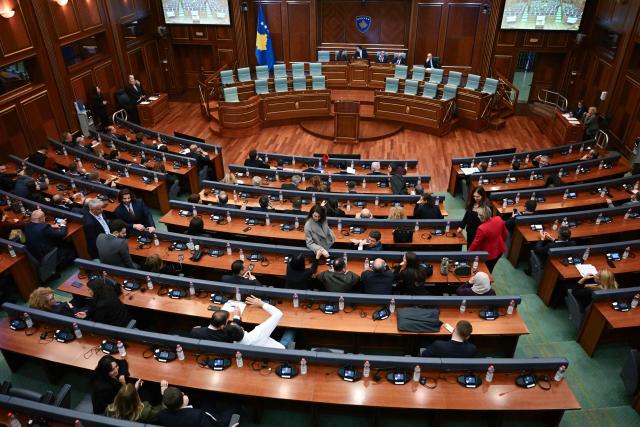 Kosovo's MPs attend a parliament session to form the new government, in Pristina on November 19, 2025. After months of political wrangling, Kosovo's caretaker prime minister Albin Kurti failed to form a government on November 19, 2025 pushing the tiny Balkan nation toward its second election in under a year. With fresh elections expected to be announced, Kurti's party will hope to improve on its result from February's vote, when it fell short of a majority despite topping the poll. (Photo by Armend NIMANI / AFP)