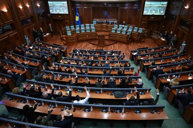 Kosovo's MPs vote during a parliament session to form the new government, in Pristina on November 19, 2025. After months of political wrangling, Kosovo's caretaker prime minister Albin Kurti failed to form a government on November 19, 2025 pushing the tiny Balkan nation toward its second election in under a year. With fresh elections expected to be announced, Kurti's party will hope to improve on its result from February's vote, when it fell short of a majority despite topping the poll. (Photo by Armend NIMANI / AFP)