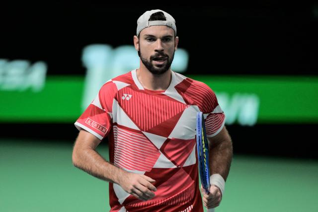 Austria's Jurij Rodionov reacts against Italy's Matteo Berretini during their Davis Cup men's singles quarter finals tennis match, at the Super Tennis Arena, in Bologna, northen Italy, on November 19, 2025. (Photo by Tiziana FABI / AFP)