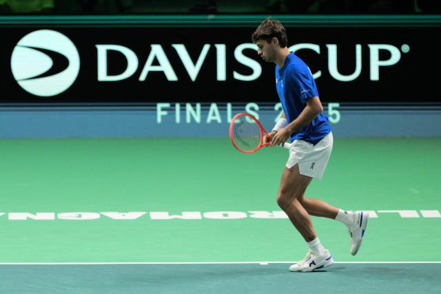 Italy's Flavio Cobolli reacts against Austria's Filip Misolic during their Davis Cup men's singles quarter finals tennis match, at the Super Tennis Arena, in Bologna, northen Italy, on November 19, 2025. (Photo by Tiziana FABI / AFP)