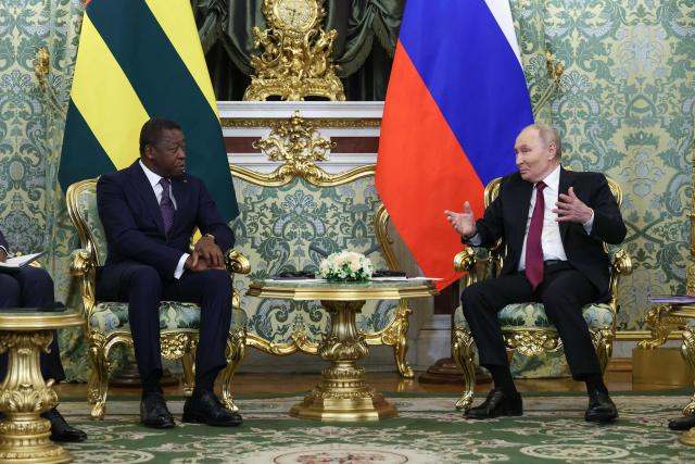 Russia's President Vladimir Putin meets with Togo's President of the Council of Ministers Faure Gnassingbe at the Kremlin in Moscow on November 19, 2025. (Photo by Ramil Sitdikov / POOL / AFP)