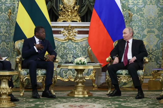 Russia's President Vladimir Putin meets with Togo's President of the Council of Ministers Faure Gnassingbe at the Kremlin in Moscow on November 19, 2025. (Photo by Ramil Sitdikov / POOL / AFP)