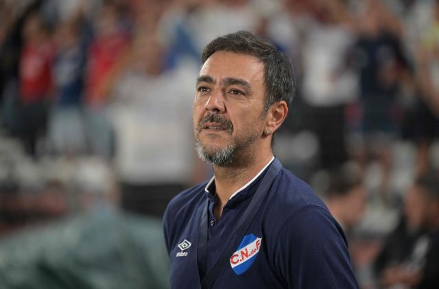 (FILES) Nacional's head coach Alvaro Recoba gestures during the Copa Libertadores third round second leg football match between Uruguay's Nacional and Bolivia's Always Ready at the Gran Parque Central stadium in Montevideo, on March 14, 2024. Uruguayan coach Alvaro "Chino" Recoba will take on his first international challenge as a manager at the helm of Deportivo Tachira, the most successful Venezuelan football club over the past five years, the team announced on November 19, 2025. (Photo by EITAN ABRAMOVICH / AFP)
