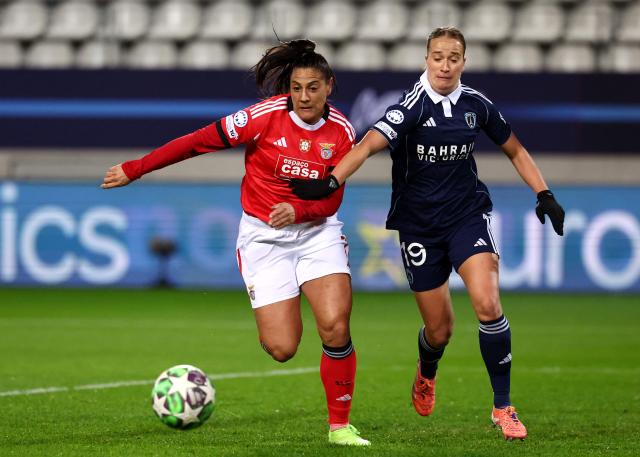 Paris FC's French defender #19 Thea Greboval (R) fights for the ball with Benfica's Spanish forward #7 Cristina Martin-Prieto during the UEFA Women's Champions League first round day 4 football match between Paris FC and SL Benficia at Stade Jean Bouin in Paris on November 19, 2025. (Photo by FRANCK FIFE / AFP)