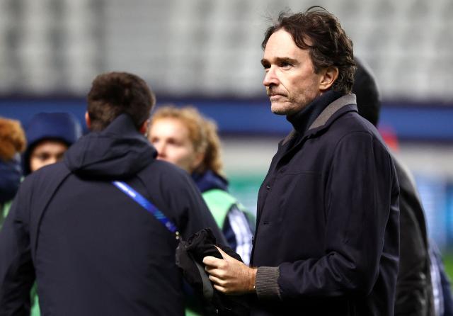 French representative of the Agache family holding company, Antoine Arnault (R) looks on at the end of the UEFA Women's Champions League first round day 4 football match between Paris FC and SL Benficia at the Stade Jean Bouin in Paris on November 19, 2025. (Photo by FRANCK FIFE / AFP)