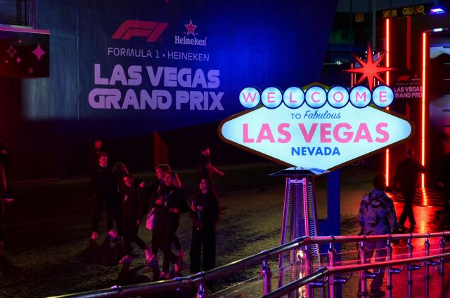 People walk near the Last Vegas Strip Circuit ahead of the Las Vegas Formula One Grand Prix on November 19, 2025, in Las Vegas, Nevada. (Photo by Frederic J. Brown / AFP)