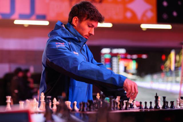 Alpine's French driver Pierre Gasly plays chess in the paddock ahead of the Las Vegas Formula One Grand Prix in Las Vegas, Nevada, on November 19, 2025. (Photo by Patrick T. Fallon / AFP)